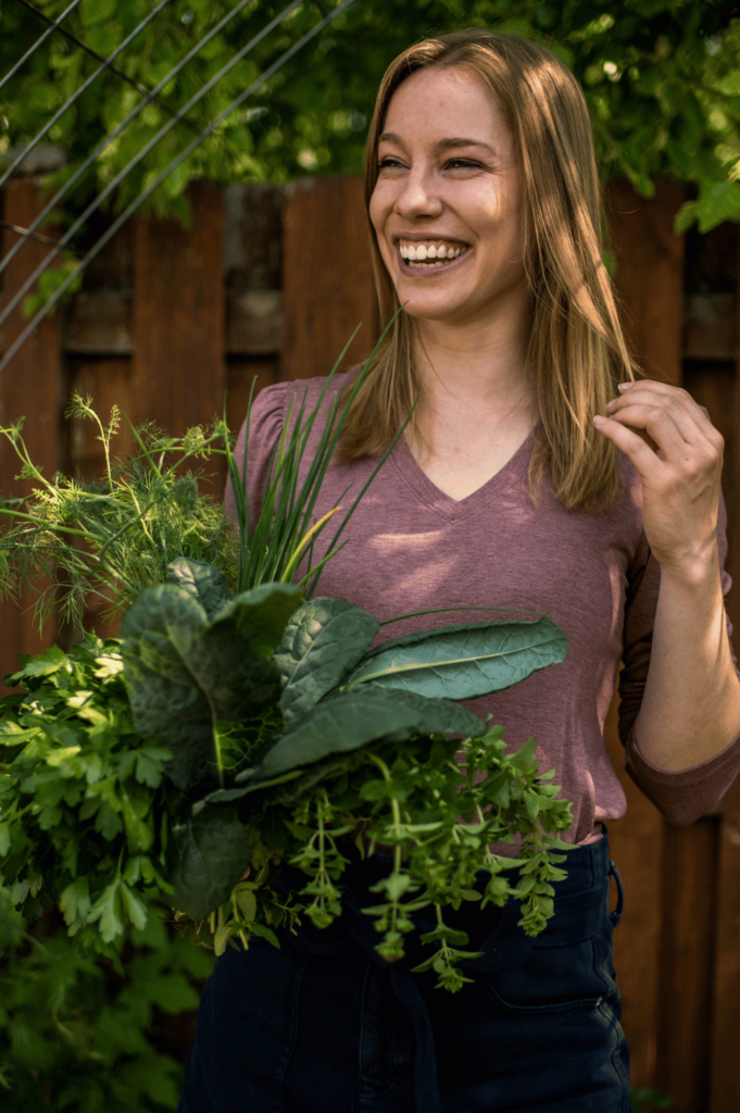 Woman Gardener Smiling in the garden